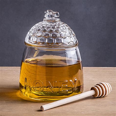 glass honey jar with dipper